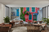 A beautiful wide-angle wall mural of a seaside town.

