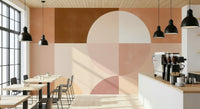An artistic modern shape mural on minimalist wallpaper.

