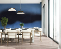 An artistic abstract cloud mural on minimalist wallpaper.