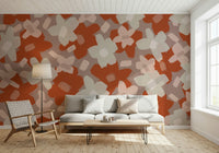 A graceful subtle bloom wall mural in warm, earthy tones.