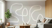 An artistic flowing line mural on minimalist wallpaper.