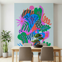 A calming foliage design wallpaper mural that defines a space.