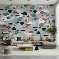 An artistic contemporary speckled mural on minimalist wallpaper.