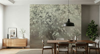A graceful subtle bloom wall mural in soft, elegant tones.