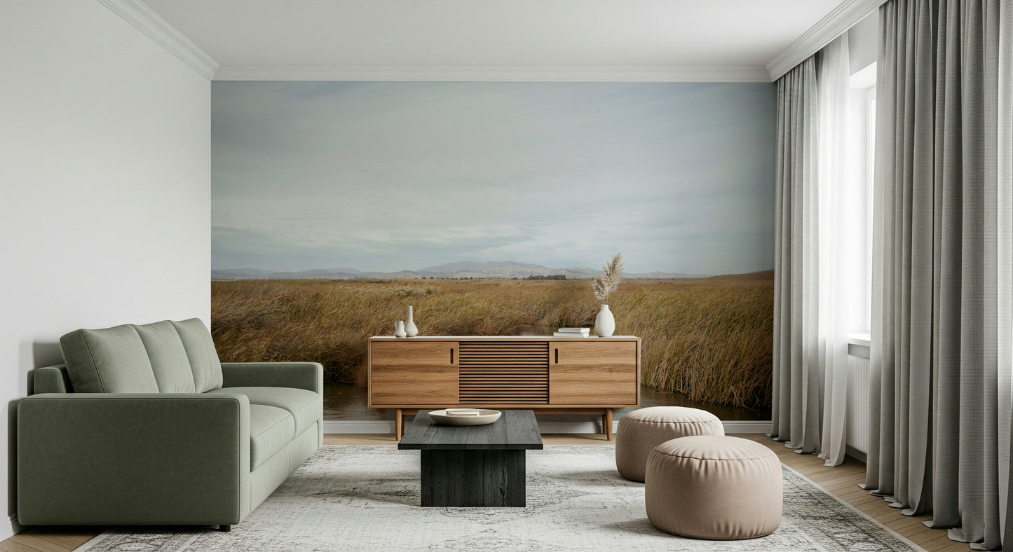 A peaceful open country mural on decorative wallpaper.