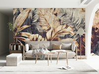 A graceful subtle leaf wall mural in warm, golden tones.