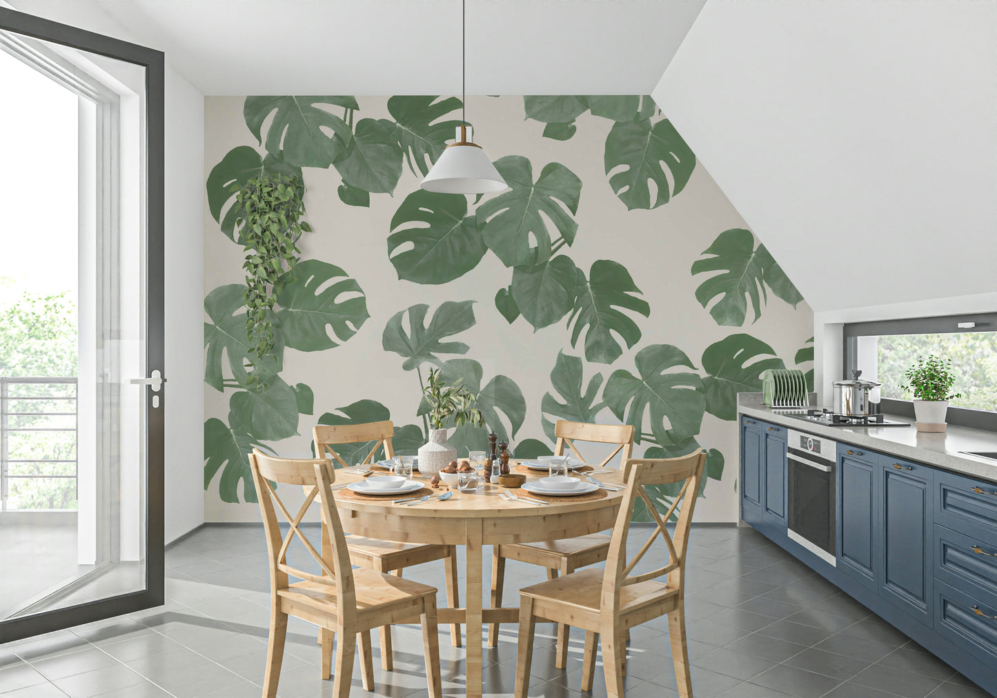 A beautiful large monstera leaf wallpaper mural with subtle light and shadows.