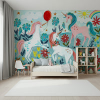 A beautiful whimsical unicorn wallpaper mural with floral accents.