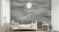 A peaceful open country mural on decorative wallpaper.