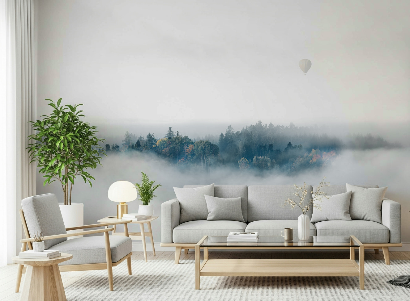 A beautiful panoramic vista wallpaper mural of mountain peaks rising above the mist.