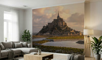 A beautiful panoramic Mont Saint-Michel wallpaper mural bathed in soft dawn light.