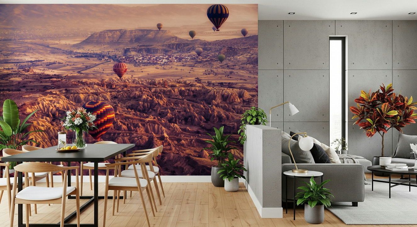 A beautiful panoramic Cappadocia wallpaper mural with floating hot air balloons.