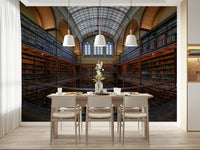 A beautiful classic library wallpaper mural with towering bookshelves and antique charm.