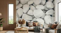 A beautiful abstract white pebble wallpaper mural with soft, rounded shapes.