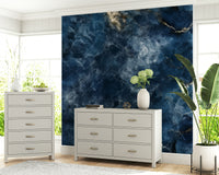 A beautiful abstract ocean wallpaper mural with fluid, deep azure and blue tones.