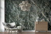 Natural stone finish wallpaper mural behind a sofa.