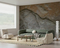 Natural dining room with eroded rock wall mural.