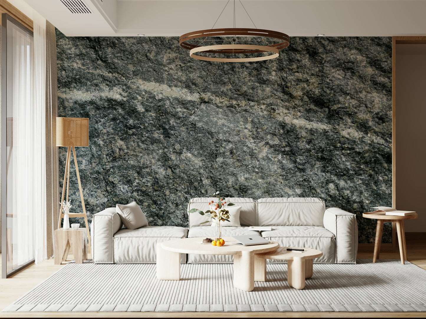 Granite grey wallpaper mural behind a minimalist sofa.