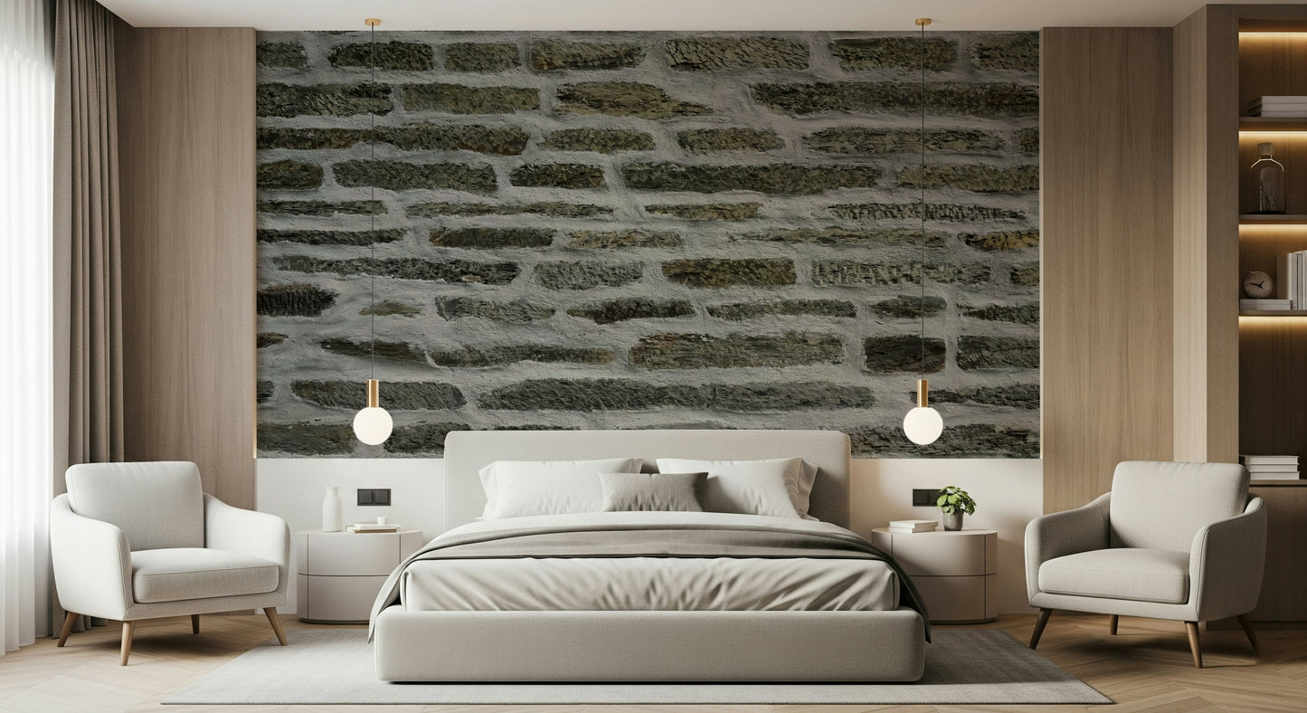 Urban stone wallpaper mural behind a sleek sofa.