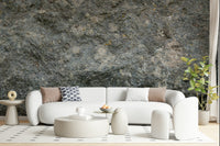 Earthy dining room with rock wallpaper mural.