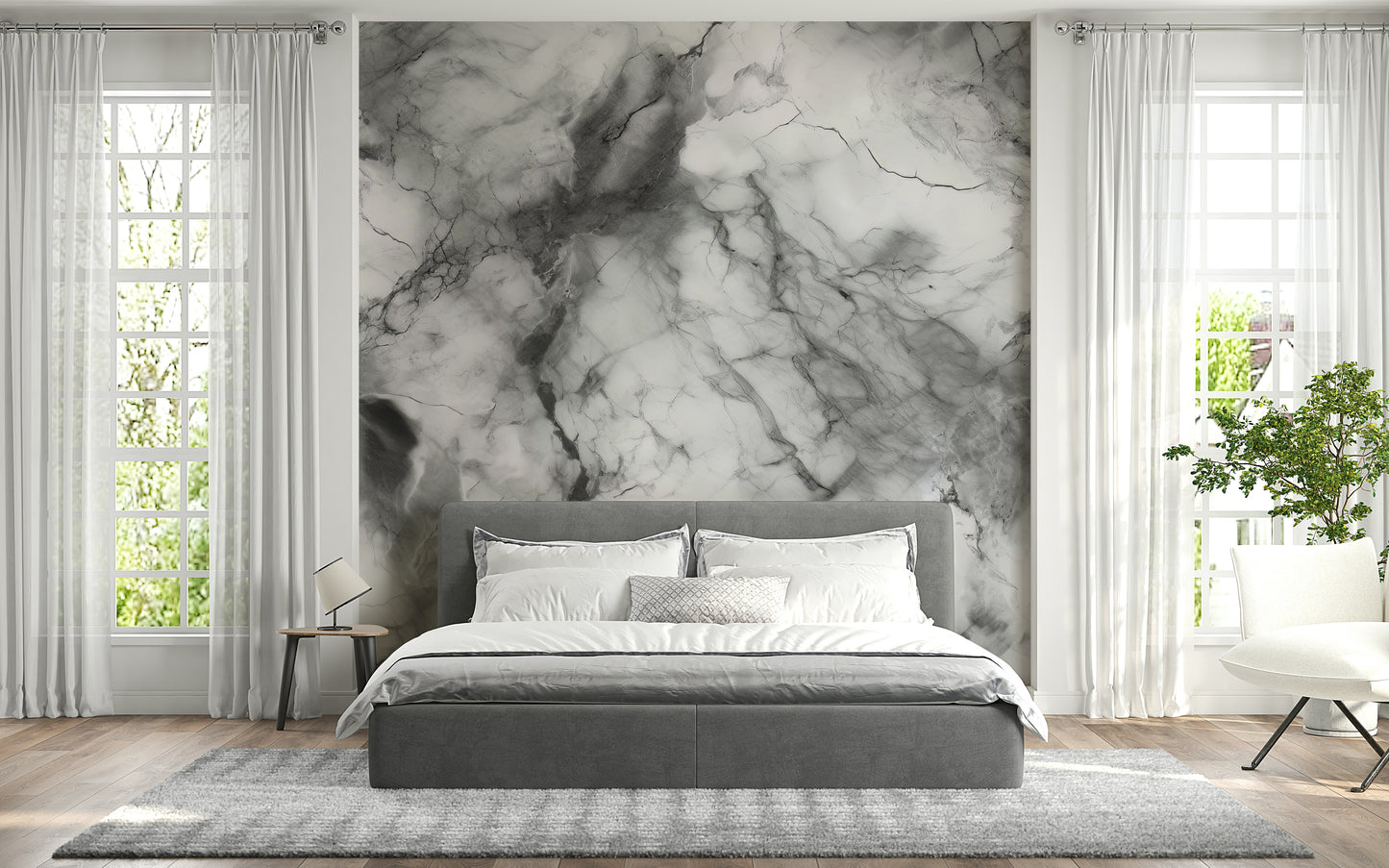 Gray marble wallpaper mural behind a modern sofa.