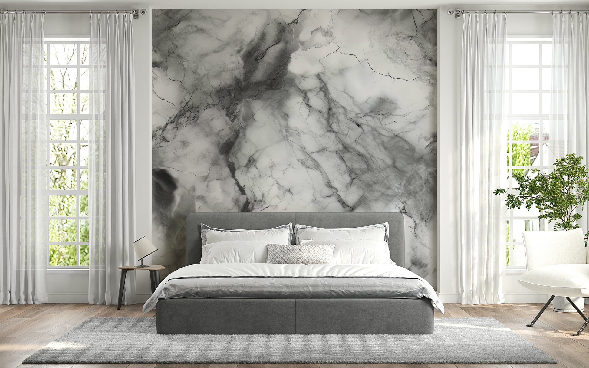 Gray marble wallpaper mural behind a modern sofa.