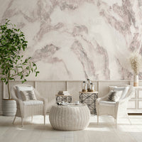 Blush stone wallpaper mural behind a modern sofa.