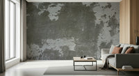 Industrial style bedroom with concrete wallpaper accent wall.