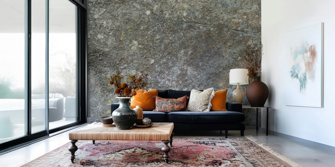 Living room with rustic stone wallpaper mural.