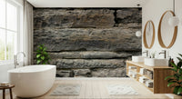 Stone texture peel and stick wallpaper installation.