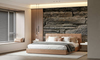 Rustic gray stone wall mural in a modern living room.