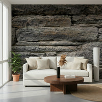 Dark gray stone wall mural bedroom feature wall.
