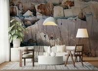 Vertical gray and beige rock patterns on the mural.