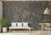 Detailed shot of mottled pink and orange hues in wallpaper mural

