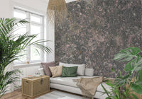 Bedroom feature wall with pink and warm stone textured wallpaper

