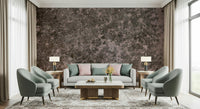 Mottled Earth wallpaper mural providing a rich, textural element behind a sofa.