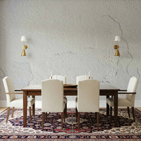 Detailed view of the faux peeling paint effect on the white peel and stick wallpaper.