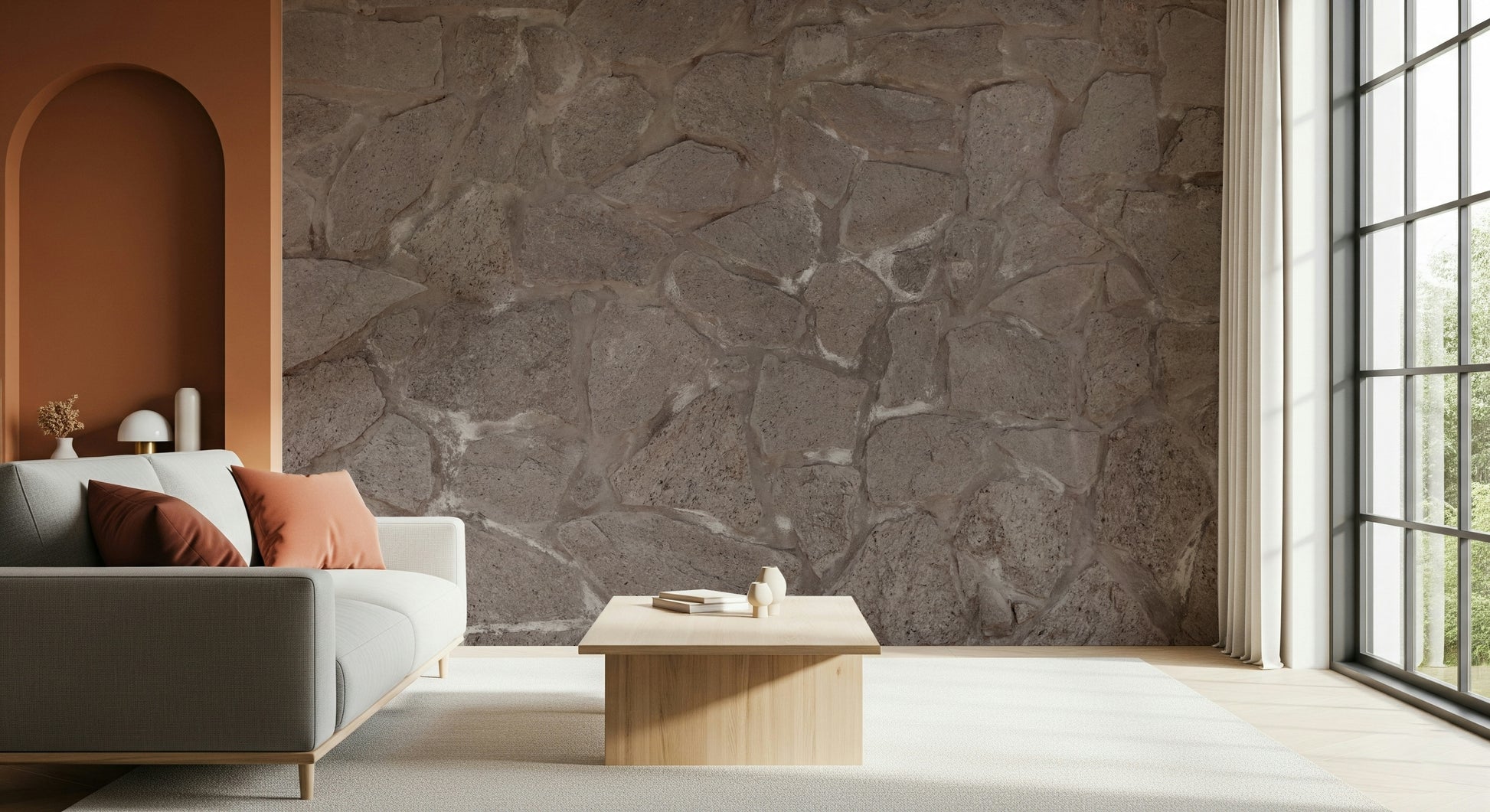 White sofa styled against the Rustic Stone Wall mural.
