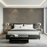 Close-up view of the natural mottled rock effect wallpaper.