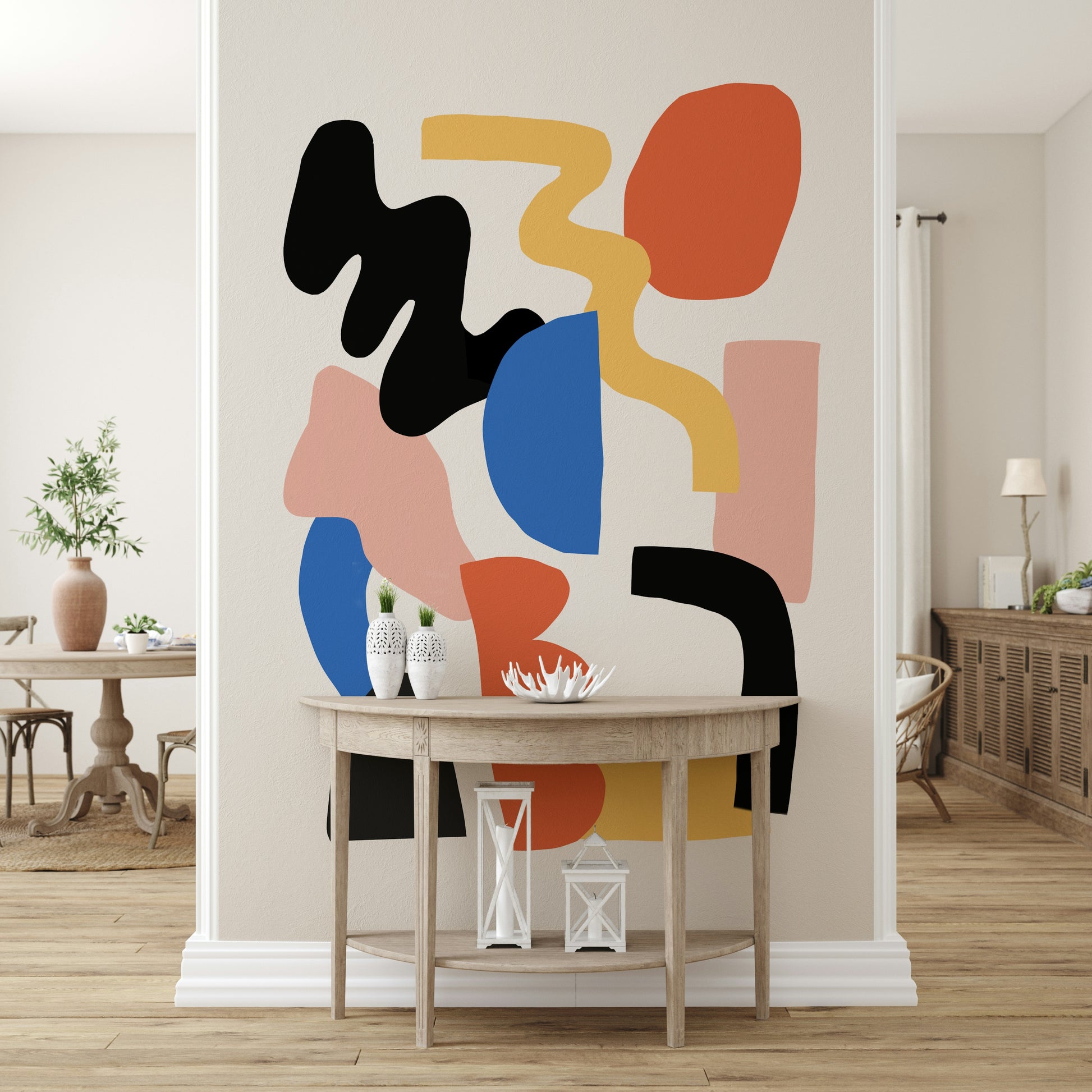 Minimalist furniture styled against the bold Block Party wallpaper.