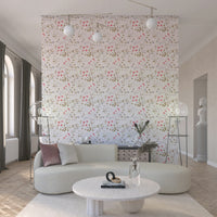 Nursery wall adorned with the serene Painterly Petals Wallpaper collection.