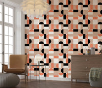 Abstract geometric shapes in blush and black.