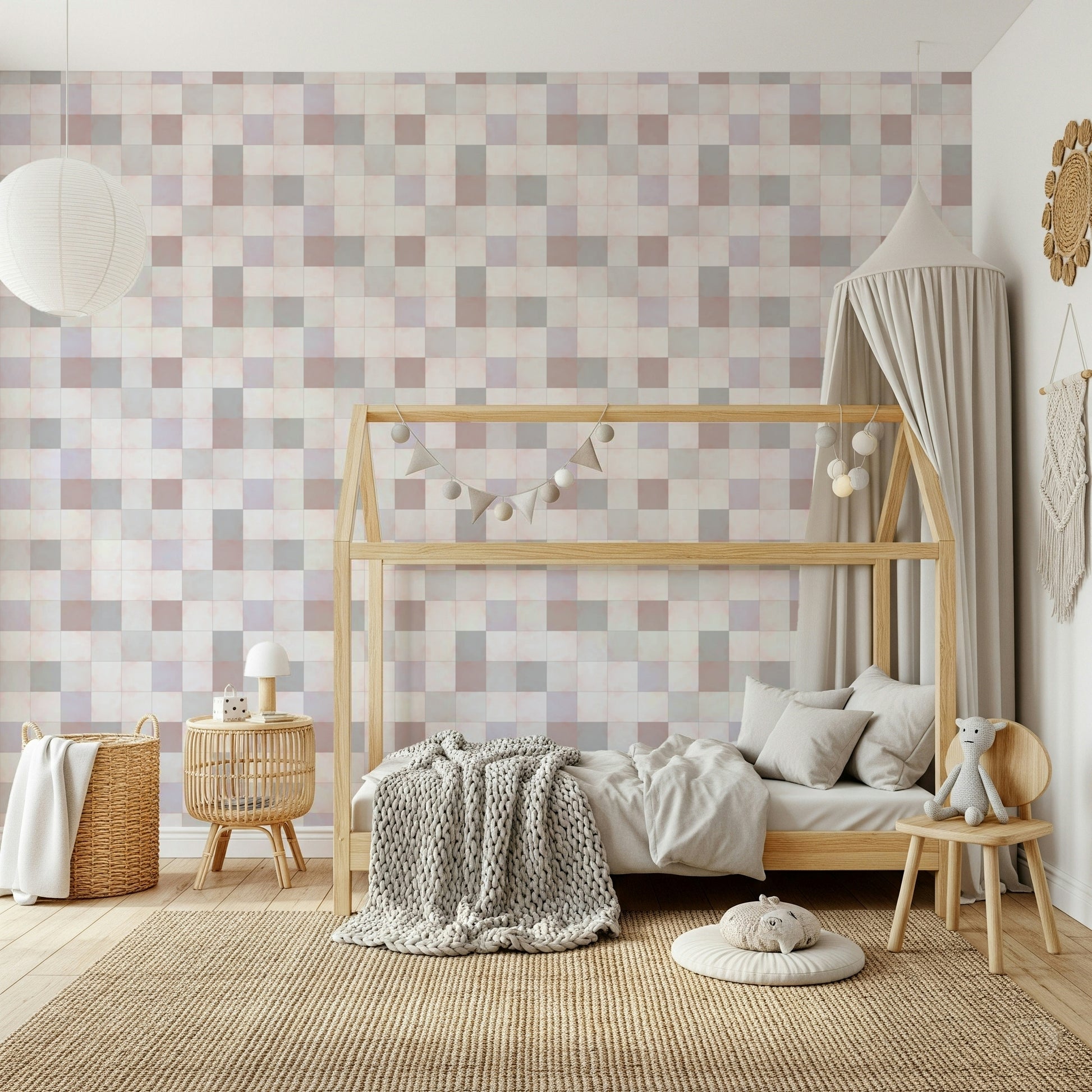 Serene nursery room with the Soft Mosaic blush and beige accent wall.
