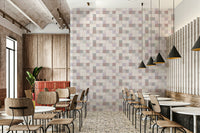 The gentle grey-blue and beige squares of the Soft Mosaic wallpaper.