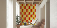 Abstract geometric wallpaper with marigold yellow and maple red blocks.