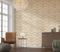 Sunlit bedroom with sand beige peel and stick wallpaper as a feature wall.

