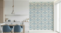 Soft blue and white blooms of the Mist Blue Wallpaper covering a space.