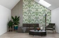An artistic pattern of blooming flowers on the Timeless Garden – Sage Green Wallpaper.
