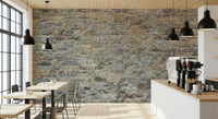 Weathered Stone Brick Wall Mural in a cozy living room setting.