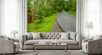 Red phone booth beside road on British Call Box Charm Wall Mural.